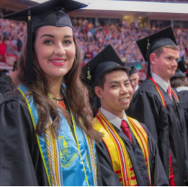 Graduates Pick Up Their Cap and Gown For U of A’s Grad Salute